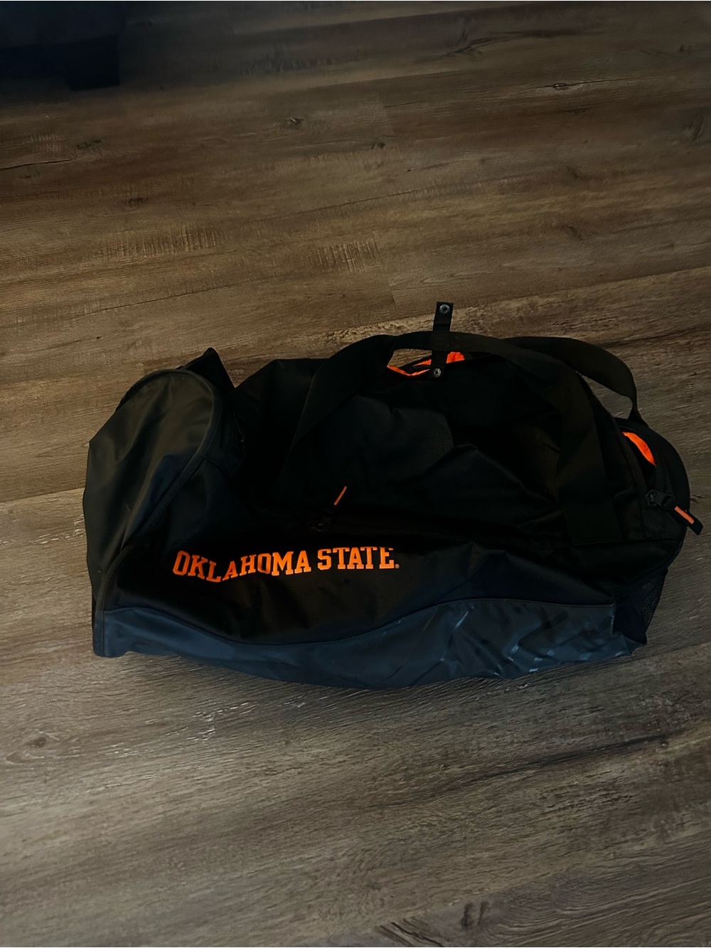 Nike Oklahoma State Black Duffel Bag with Orange Oklahoma State Logo